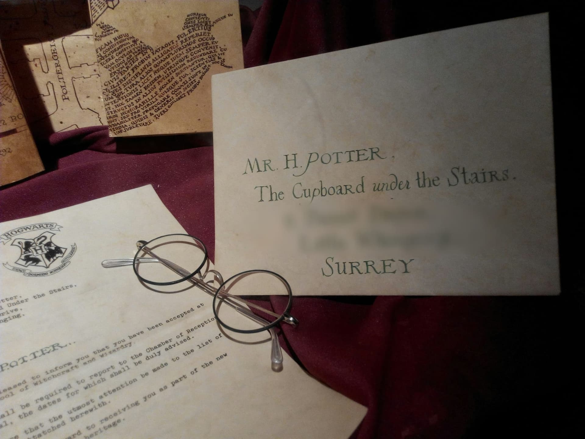 Close-up of an image of a letter from Harry Potter and its address being blurred by BlurMe app